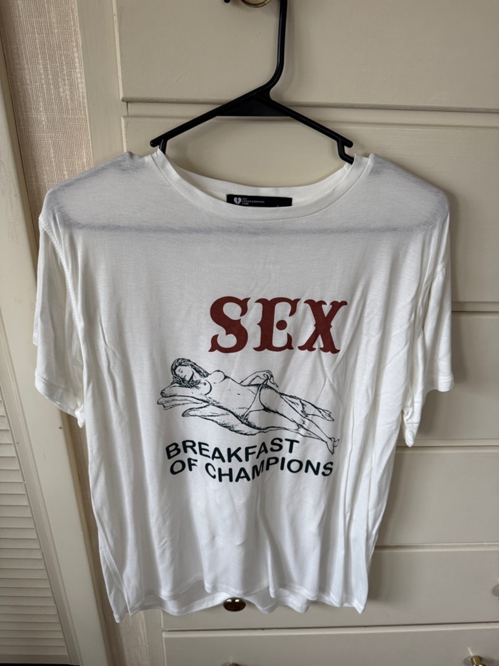White Graphic Tee with 'SEX Breakfast of Champions' Print